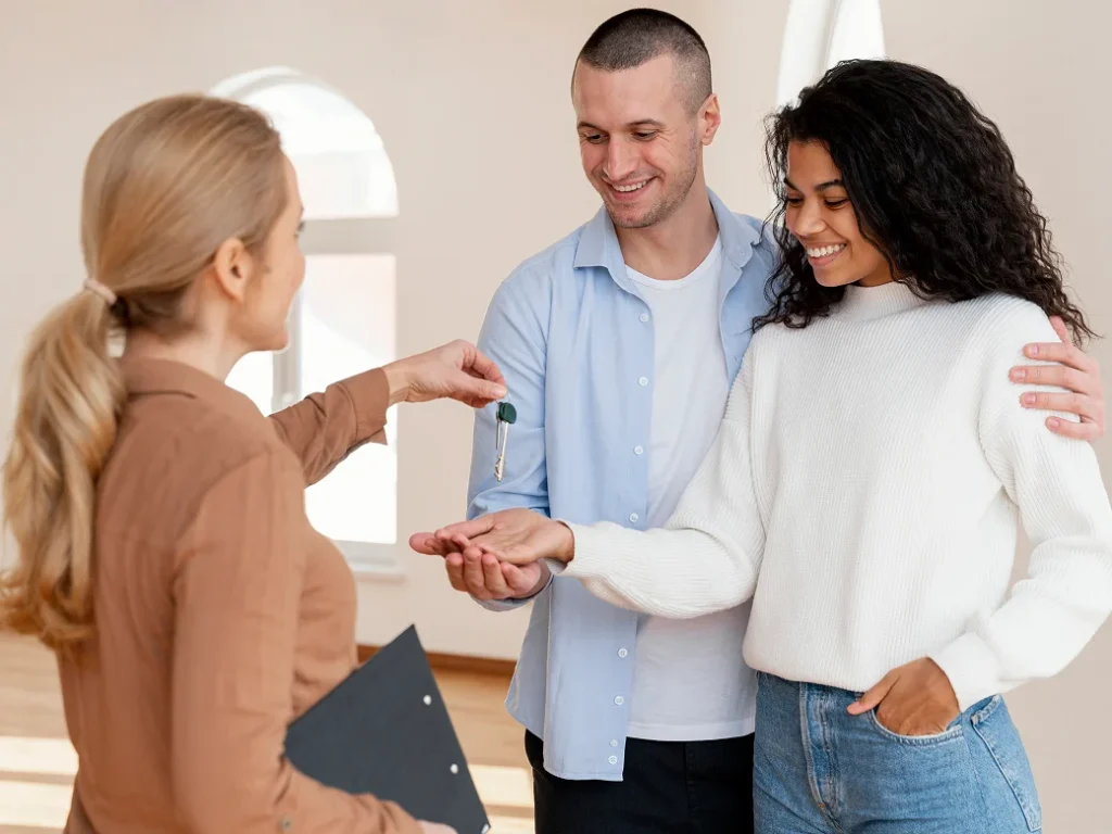 Home buyers discussing FHA mortgage financing